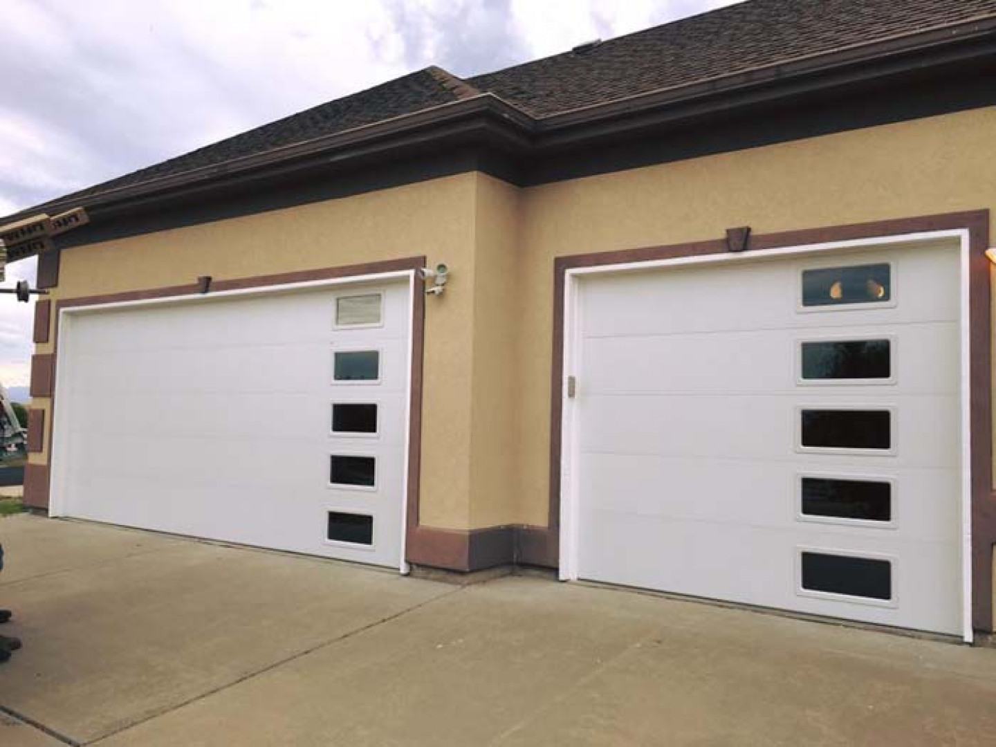 Unique Electric Garage Door Installation with Modern Design